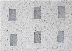 White terrazzo flooring with small crazee rectangle marble stone