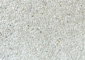 White wall plaster with exposed marble aggregates