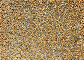 Grey wall finish with washed mustard aggregates