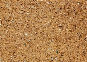 Mustard yellow exposed aggregate plaster