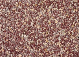 Rich brown grit plaster with clearly exposed scarlet and buff aggregates, adding vibrant earthy tones to the wall