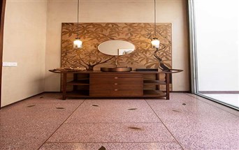 Terrazzo polished floor with stone inlays